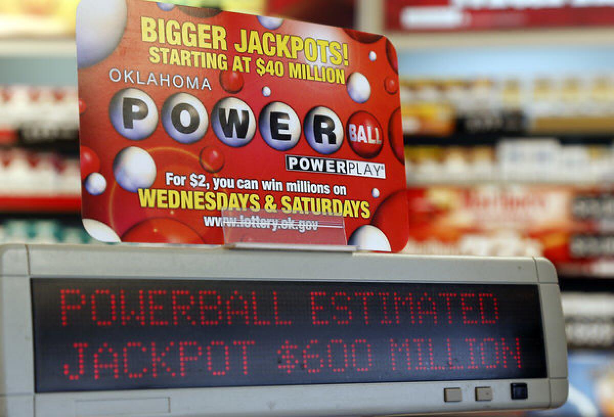 A sign at a store advertises the Powerball Lottery in Oklahoma City.