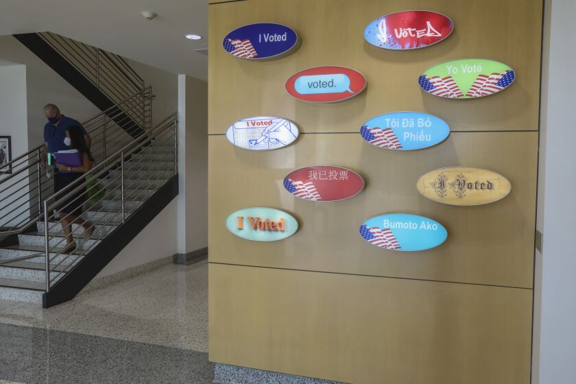 SAN DIEGO, CA - OCTOBER 14: A display of "I voted" stickers in several languages is an art piece at the Registrar of Voters on Wednesday, Oct. 14, 2020 in San Diego, CA. (Eduardo Contreras / The San Diego Union-Tribune)