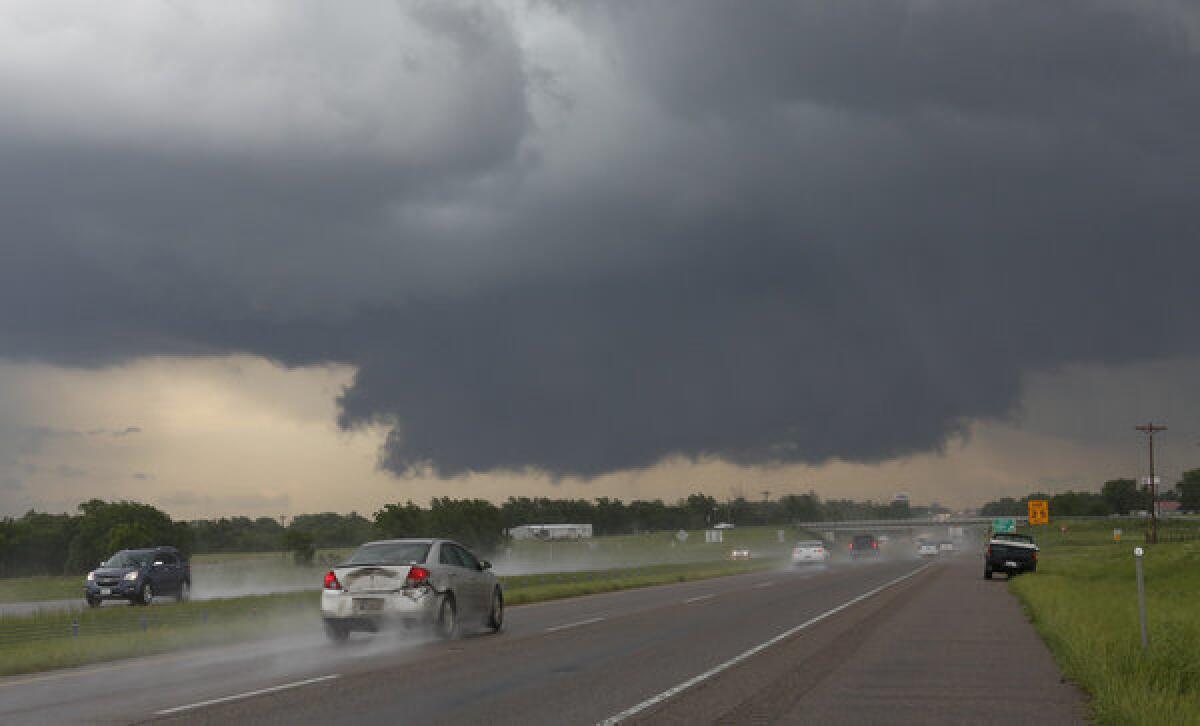 A wall cloud forms near Purcell, Okla., on Thursday. More severe weather threatened Friday.