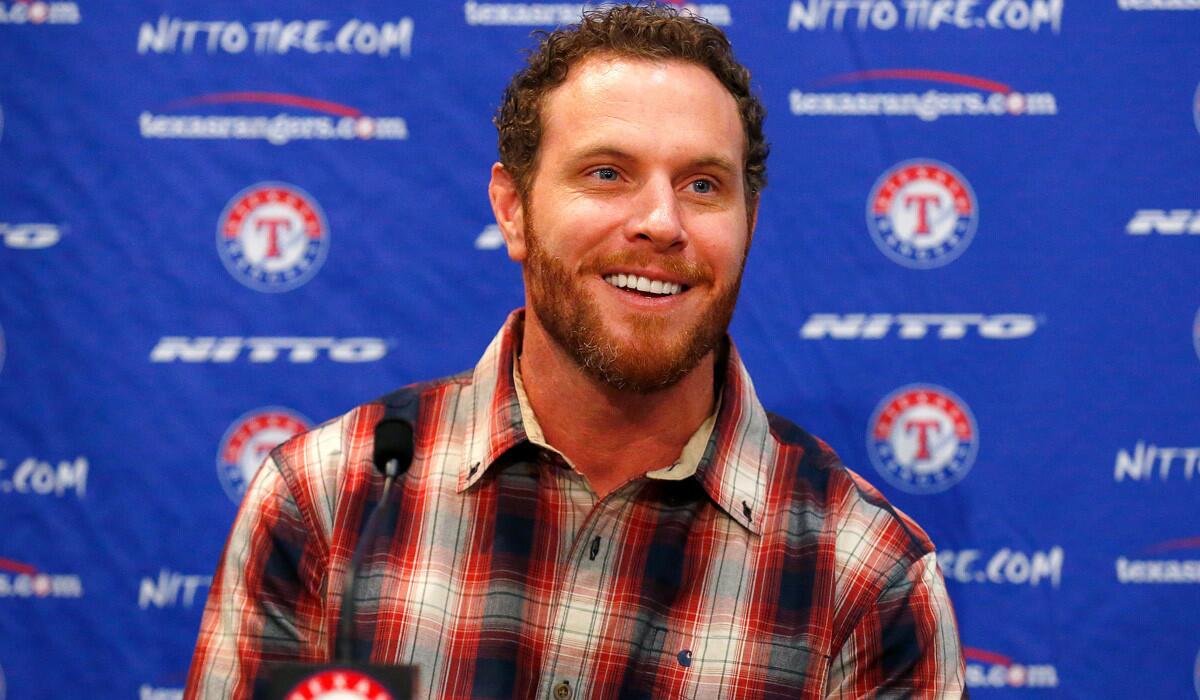 Texas Rangers introduced Josh Hamilton on Monday. Hamilton was acquired from the Angels.