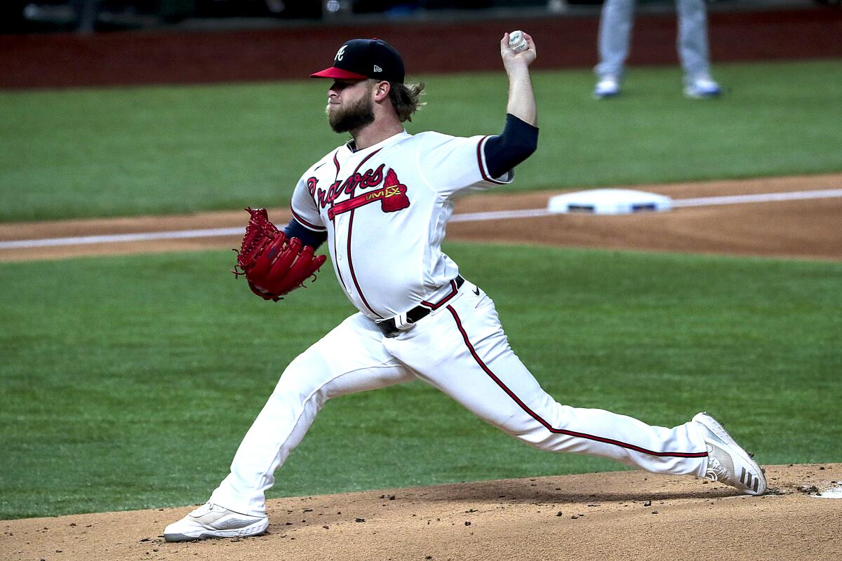Atlanta Braves opener A.J. Minter delivers during the first inning of Game 5 of the NLCS against the Dodgers.