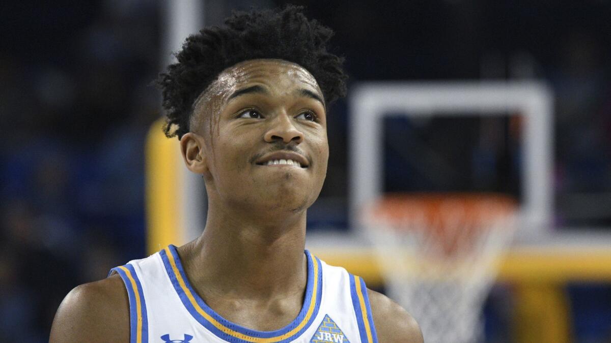 UCLA guard Jaylen Hands smiles after making a three-point shot on Dec. 29.