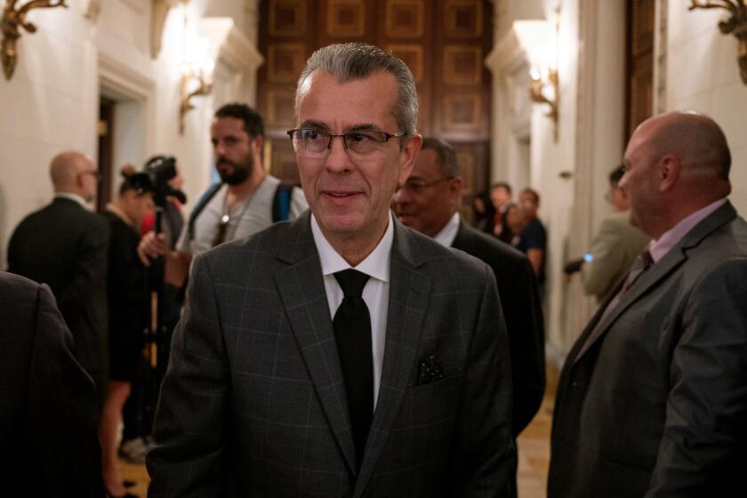 The new authority of the National Electoral Council (CNE), rector Juan Carlos Delpino leaves after being sworn in, during a session to elect the new Venezuelan electoral authorities at the National Assembly in Caracas on August 24, 2023. (Photo by Federico PARRA / AFP) (Photo by FEDERICO PARRA/AFP via Getty Images)