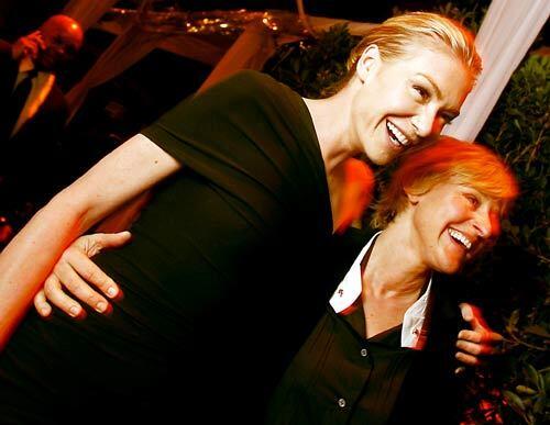 Ellen DeGeneres, right, and partner Portia de Rossi are all smiles Jan. 12 during the the Art of Elysium's 10-year anniversary gala charity event at Vibiana, a restored cathedral in downtown Los Angeles. The nonprofit organization, dedicated to bringing art, music and fashion to seriously ill children in hospitals, has gained the kind of hip cachet usually reserved for indie bands.