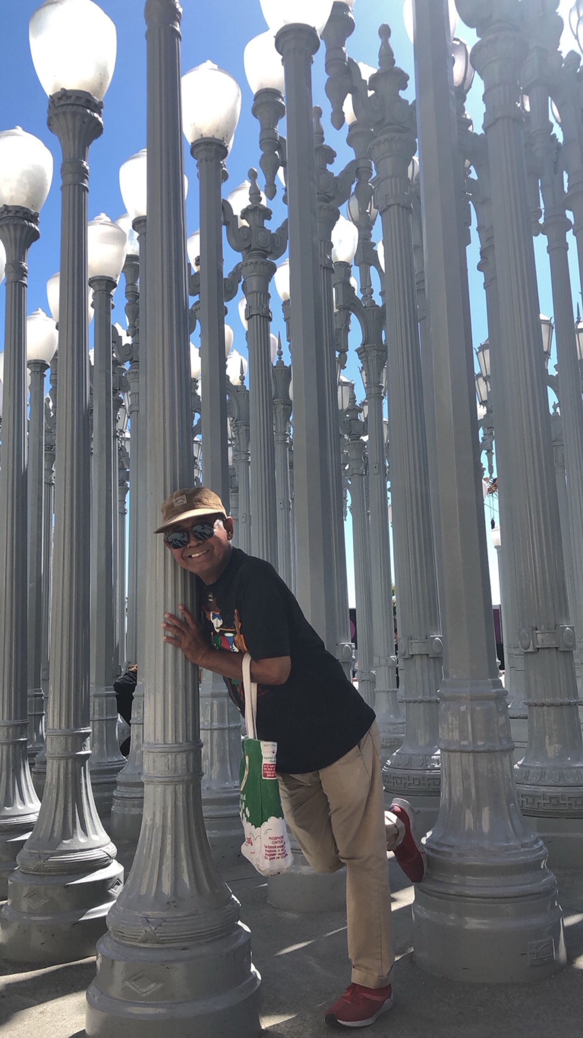 Ben Barcelona in happier times, at LACMA's "Urban Light," on one of his Thursday visits in July 2019. 