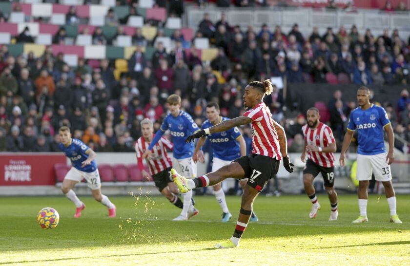 Brentford's Ivan Toney scores their side's first goal of the game, during the English Premier League soccer match between Brentford and Everton, at Brentford Community Stadium, in London, Sunday, Nov. 28, 2021. (John Walton/PA via AP)