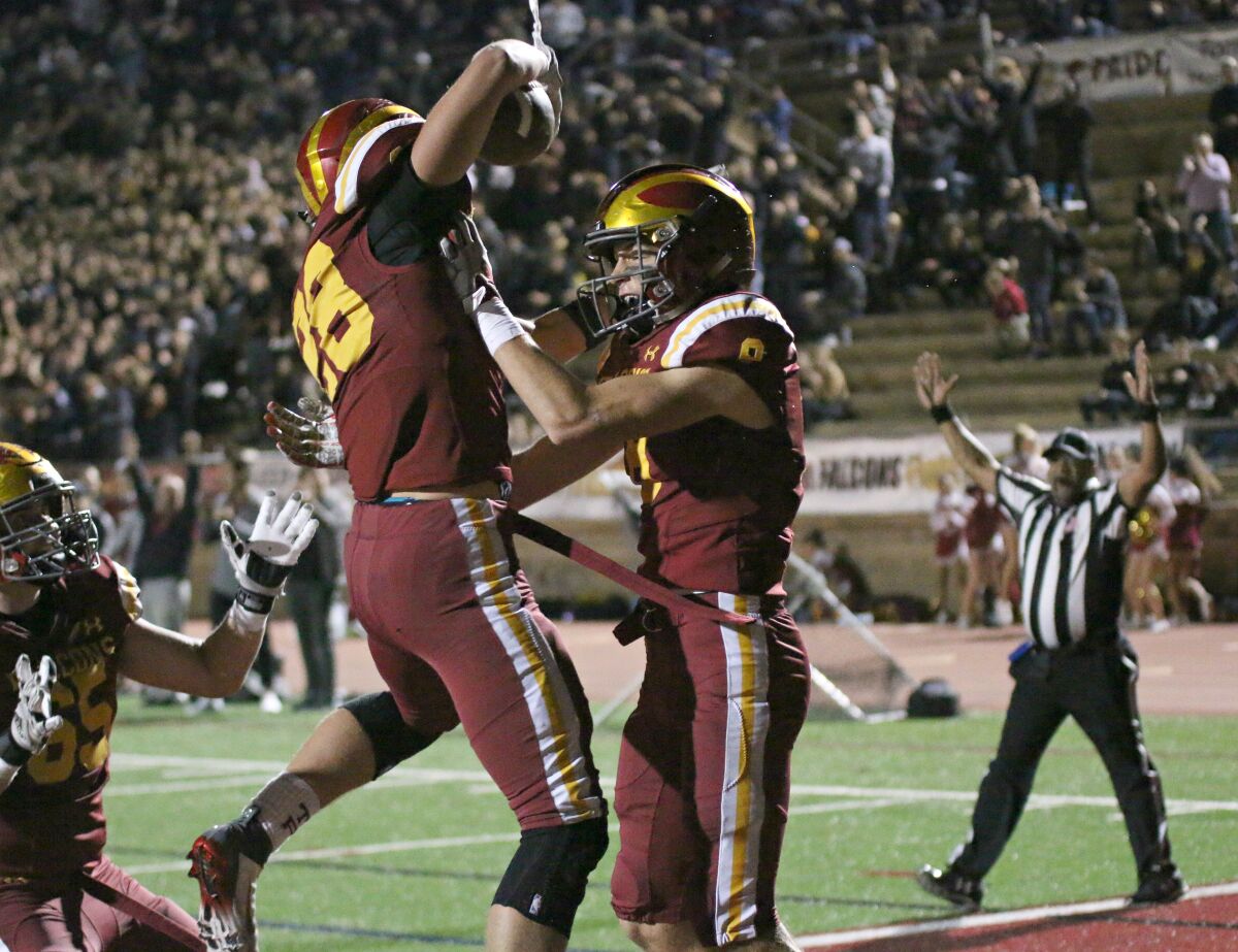 The Falcons Marco Notarainni (#28) scored the first touchdown of the night.