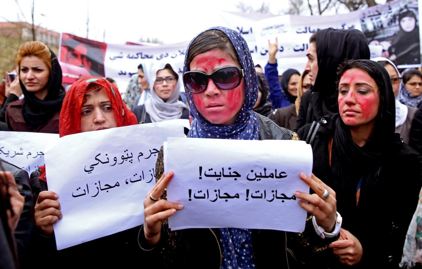 Afghan protests mob killing of woman