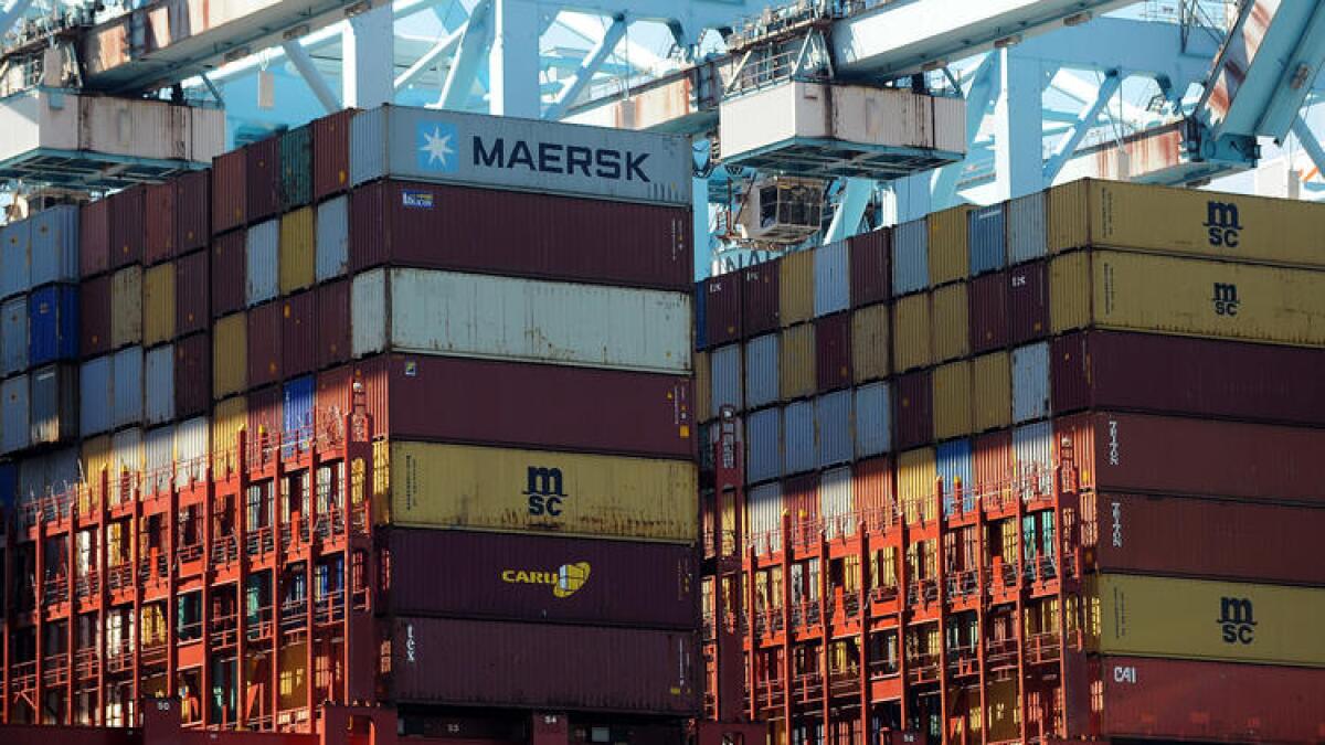 Stacks of containers are unloaded at the Port of Los Angeles last year.