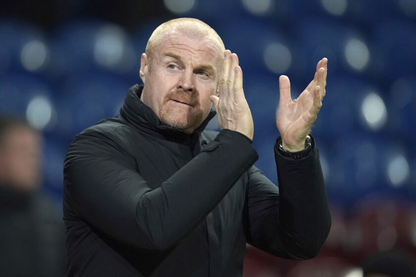 FILE - Burnley's manager Sean Dyche applauds the fans prior to the start of the English Premier League soccer match between Burnley and Leicester City at Turf Moor stadium in Burnley, England on March 1, 2022. Everton has turned to Sean Dyche in its fight to secure Premier League survival. The former Burnley manager was hired by Everton as the successor to Frank Lampard on Monday Jan. 30, 2023 and has signed a two-and-a-half-year contract. (AP Photo/Jon Super, File)