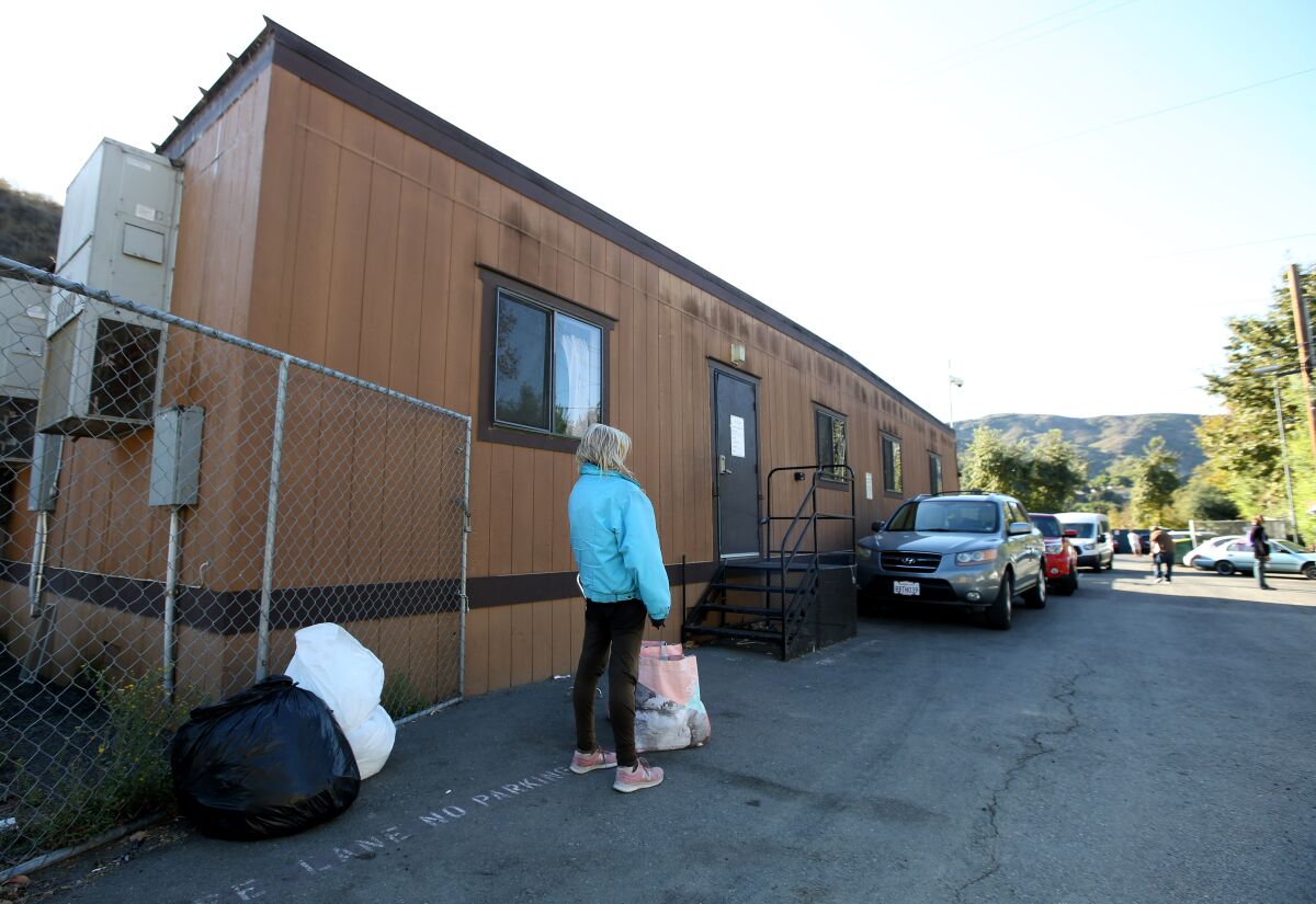 The Alternative Sleeping Location in Laguna Beach, operated by Friendship Shelter, offers homeless people a laundry room, bathrooms and showers, housing search services and more.