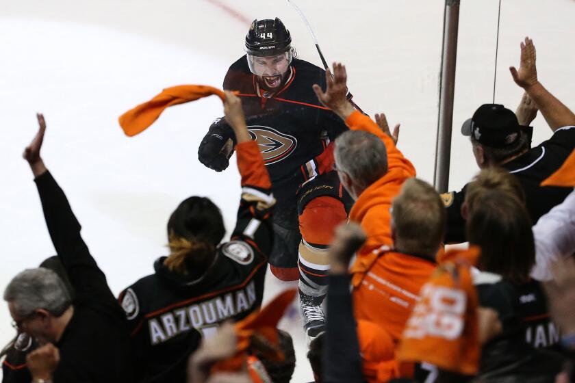 Ducks center Nate Thompson celebrates with fans after scoring a third period goal to give Anaheim a 3-1 lead over the Chicago Blackhawks in Game 1 of the Stanley Cup Western Conference finals at the Honda Center on May 17, 2015.