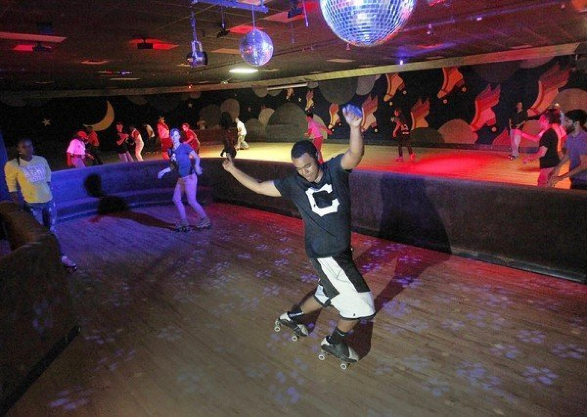 Roller skaters enjoying the final days of World on Wheels, which temporarily closed in 2013.