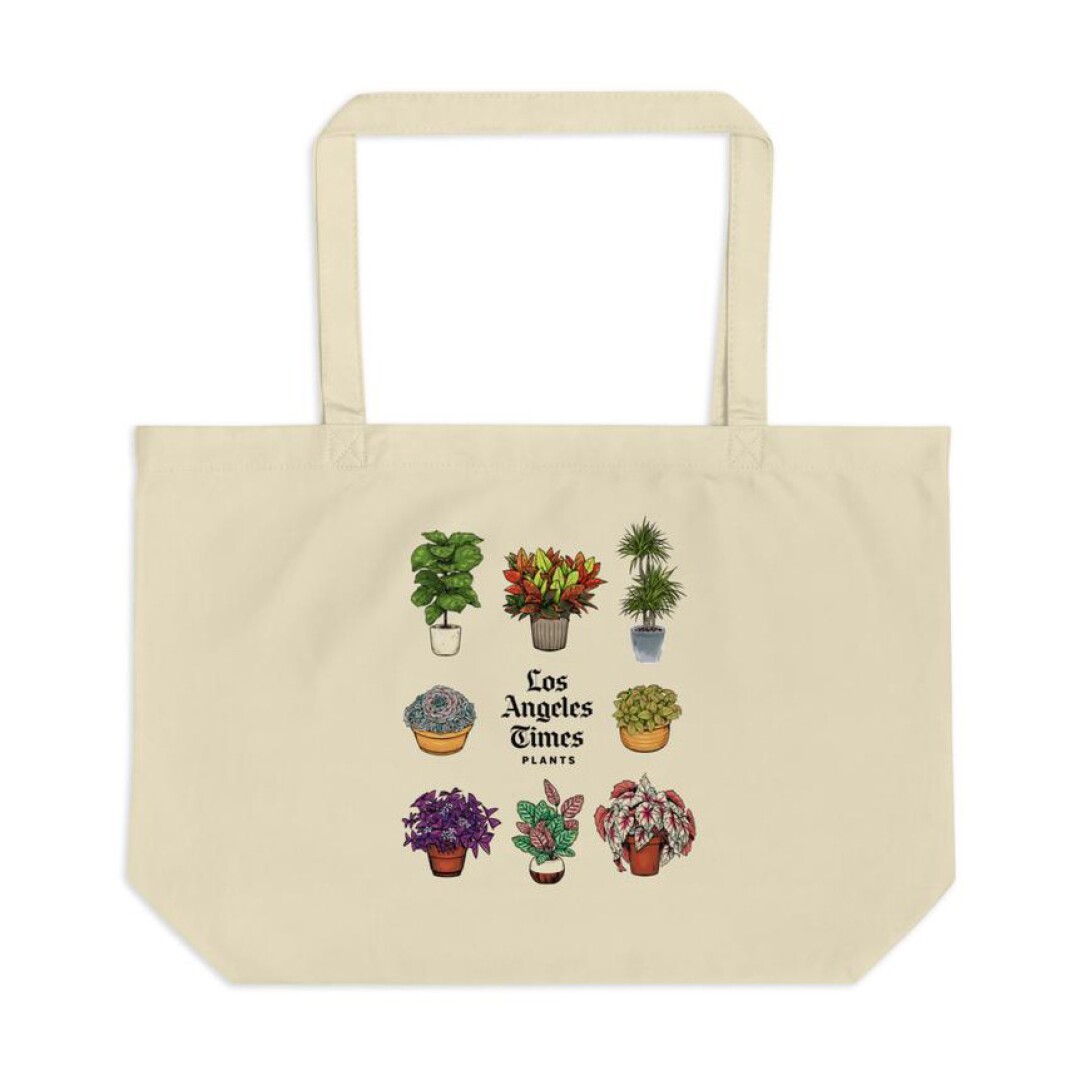 A tote bag with images of plants on it.