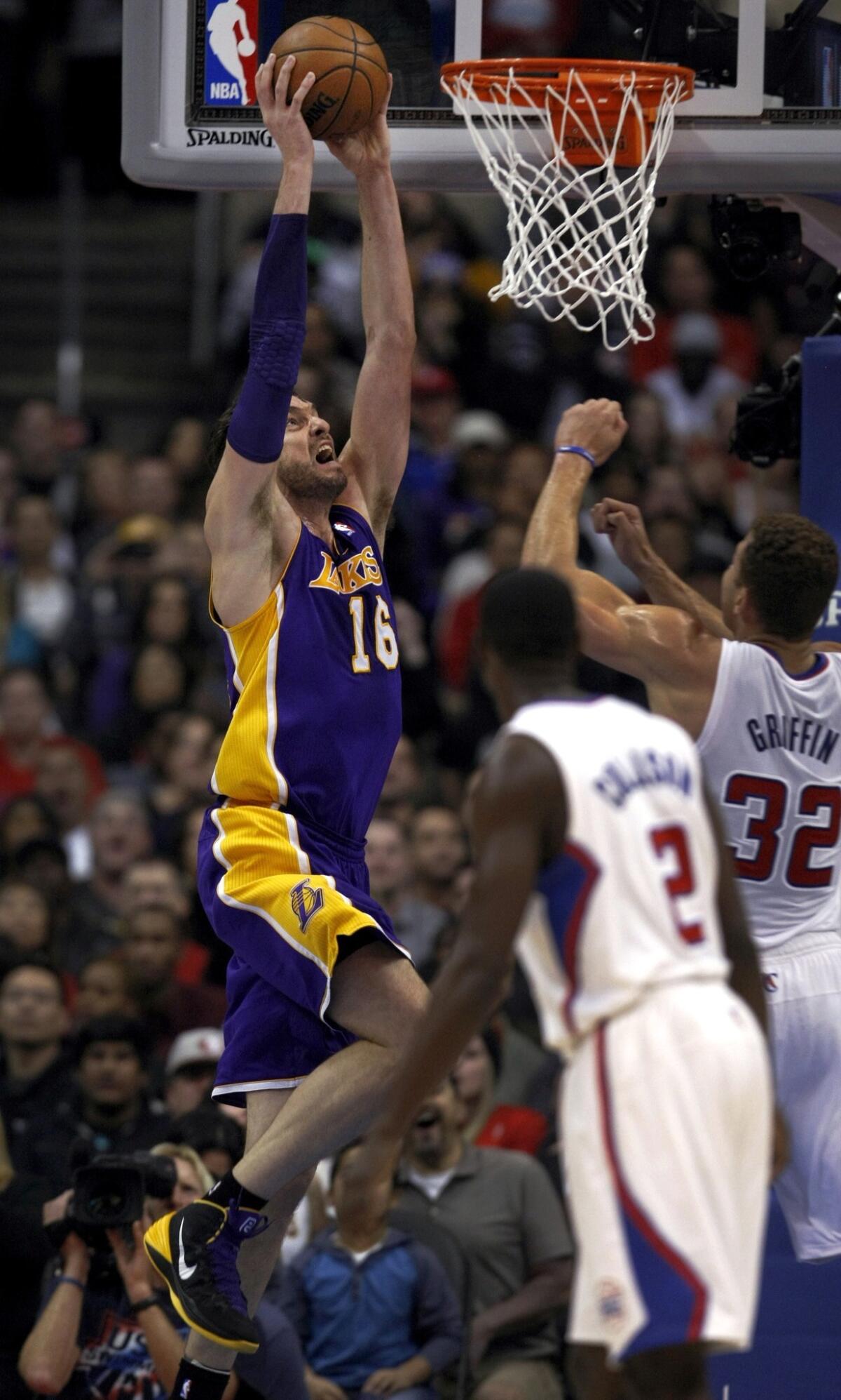 The Lakers' Pau Gasol goes up for a dunk against the Clippers.