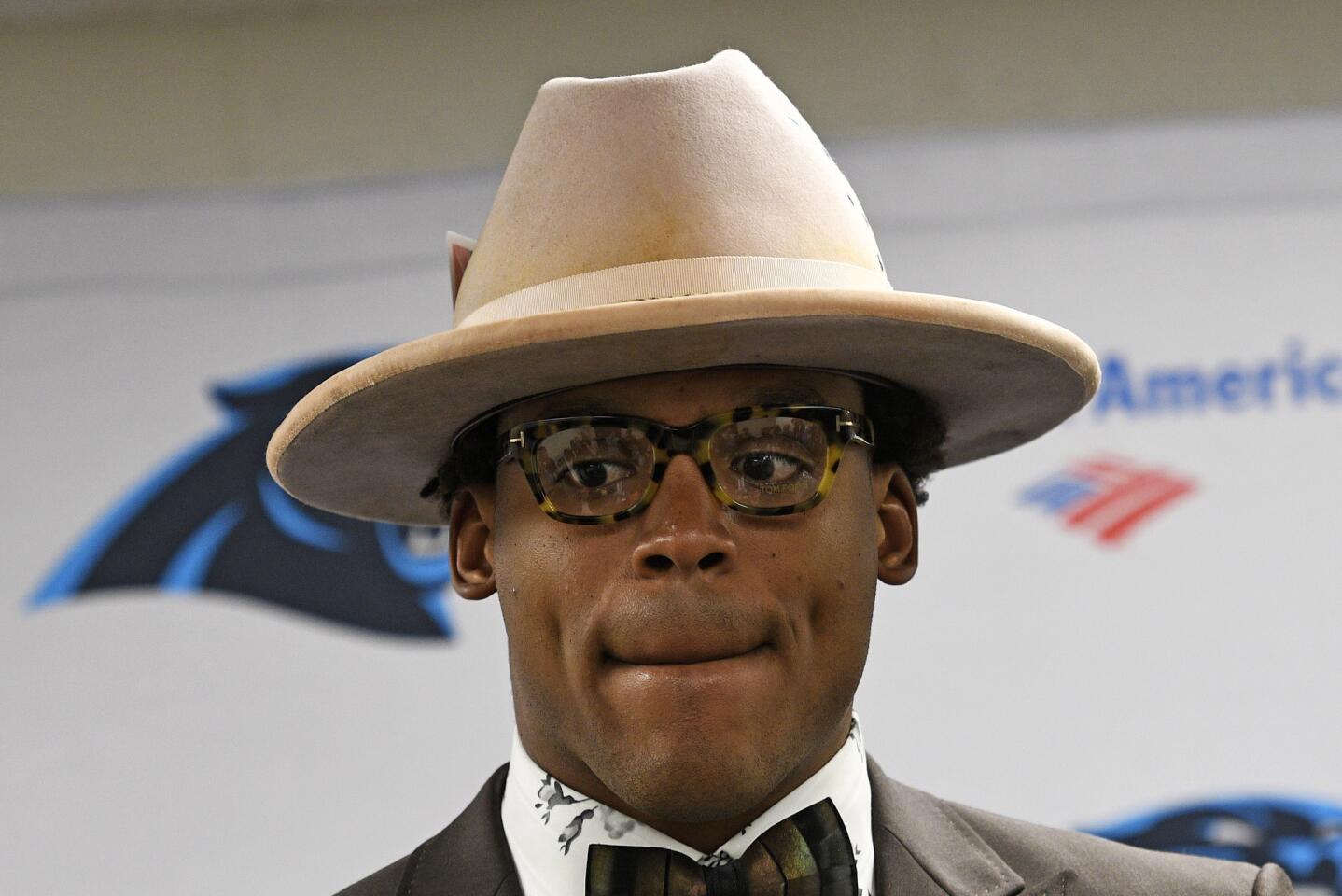 Carolina Panthers quarterback Cam Newton talks with reporters following a 52-21 loss to the Pittsburgh Steelers in an NFL football game in Pittsburgh, Friday, Nov. 9, 2018. (AP Photo/Don Wright)