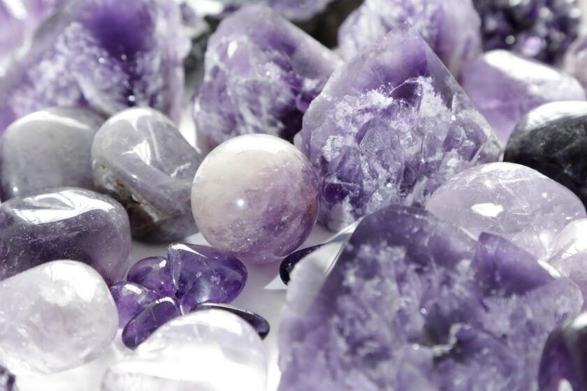 HIGHLAND PARK, CA -- JUNE 28, 2019: Amethyst, named as a sobriety stone, is one of the popular stones sold at House of Intuition which specializes in spiritual goods and gifts. The first store, founded by Marlene Vargas and Alex Naranjo, opened in 2010. Now, there are six stores throughout the Los Angeles area. (Myung J. Chun / Los Angeles Times)