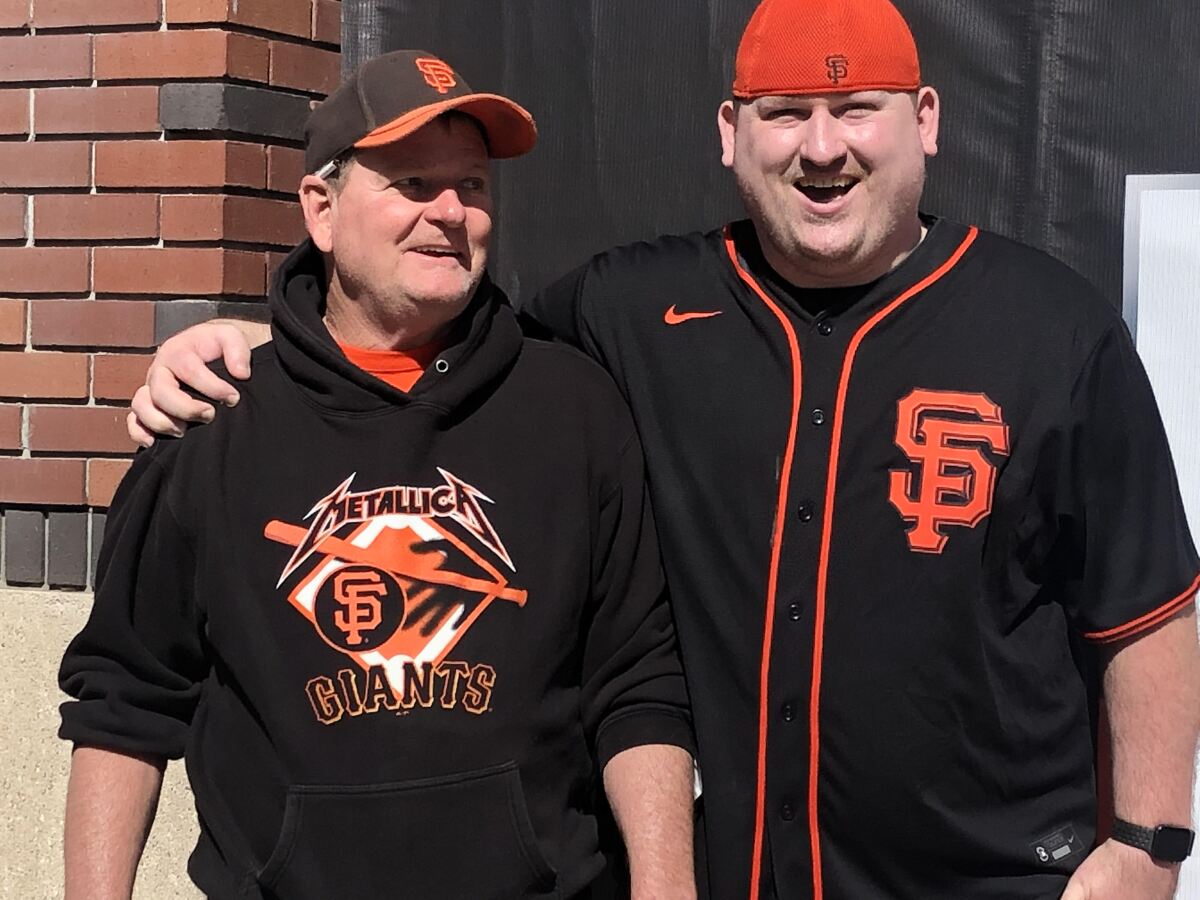 Don and Matt Davis, Giants fans who have strong opinions about their Dodgers counterparts.