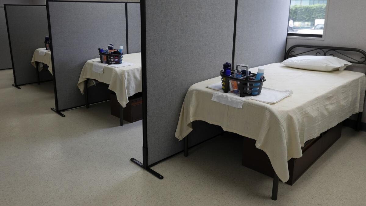 Dorm-style beds were installed in a homeless shelter in the downtown El Pueblo district, the first of Mayor Eric Garcetti's A Bridge Home temporary housing projects.