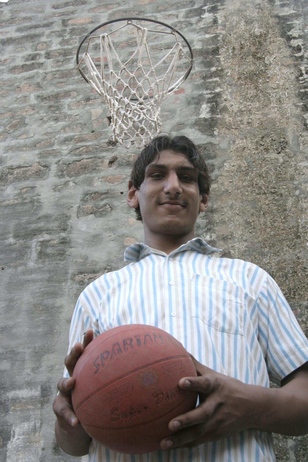 Satnam Singh, pictured in 2010, was drafted by the Dallas Mavericks in this year's NBA draft. He is the first Indian-born player in the league.