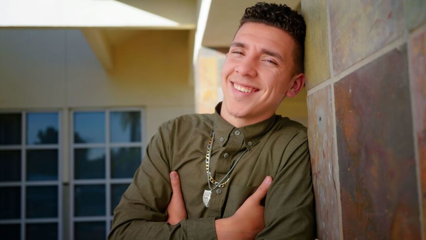 Emilio Carranza-Davis, a former foster kid who is now a certified lifeguard, a Boy Scout honoree and a student attending Mesa College as part of the Promises2Kids Guardian Scholar Program.