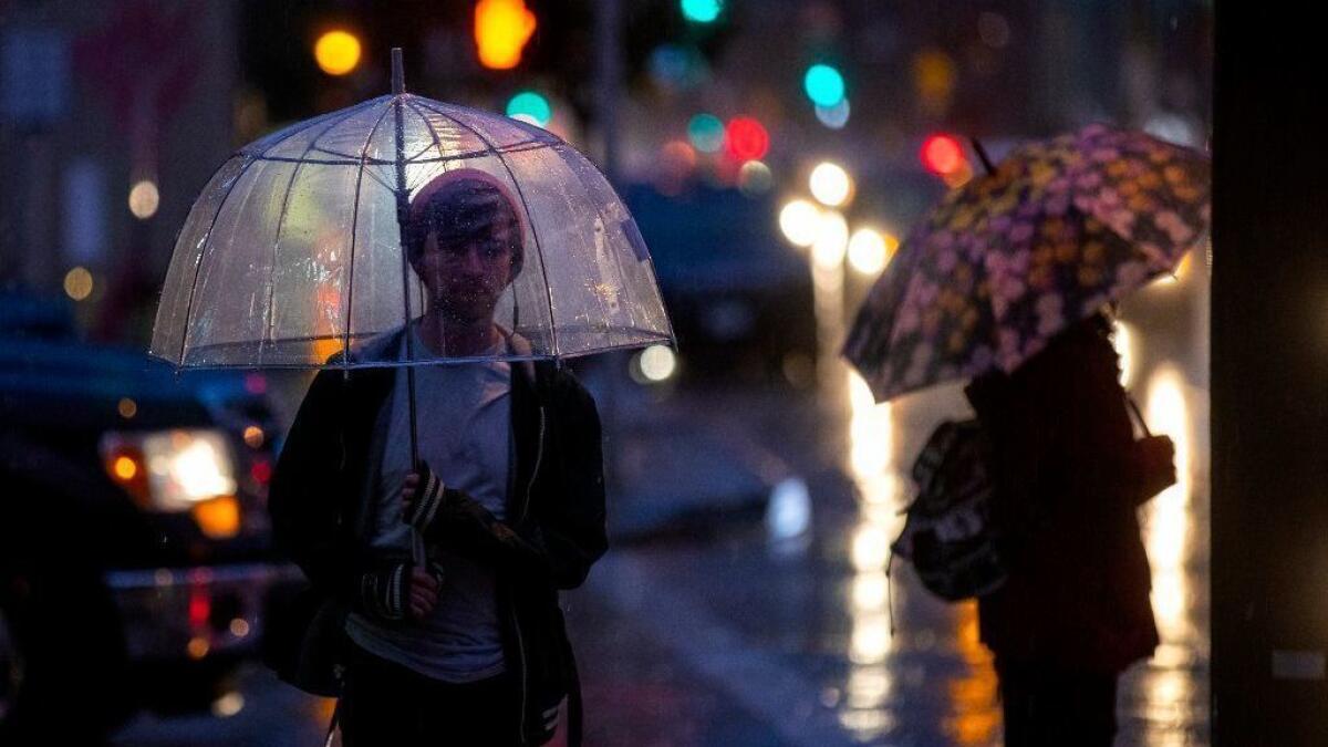 Rain pelts Pasadena on Tuesday evening. The latest in a series of winter storms is expected to bring steady rain to Southern California into Thursday afternoon.