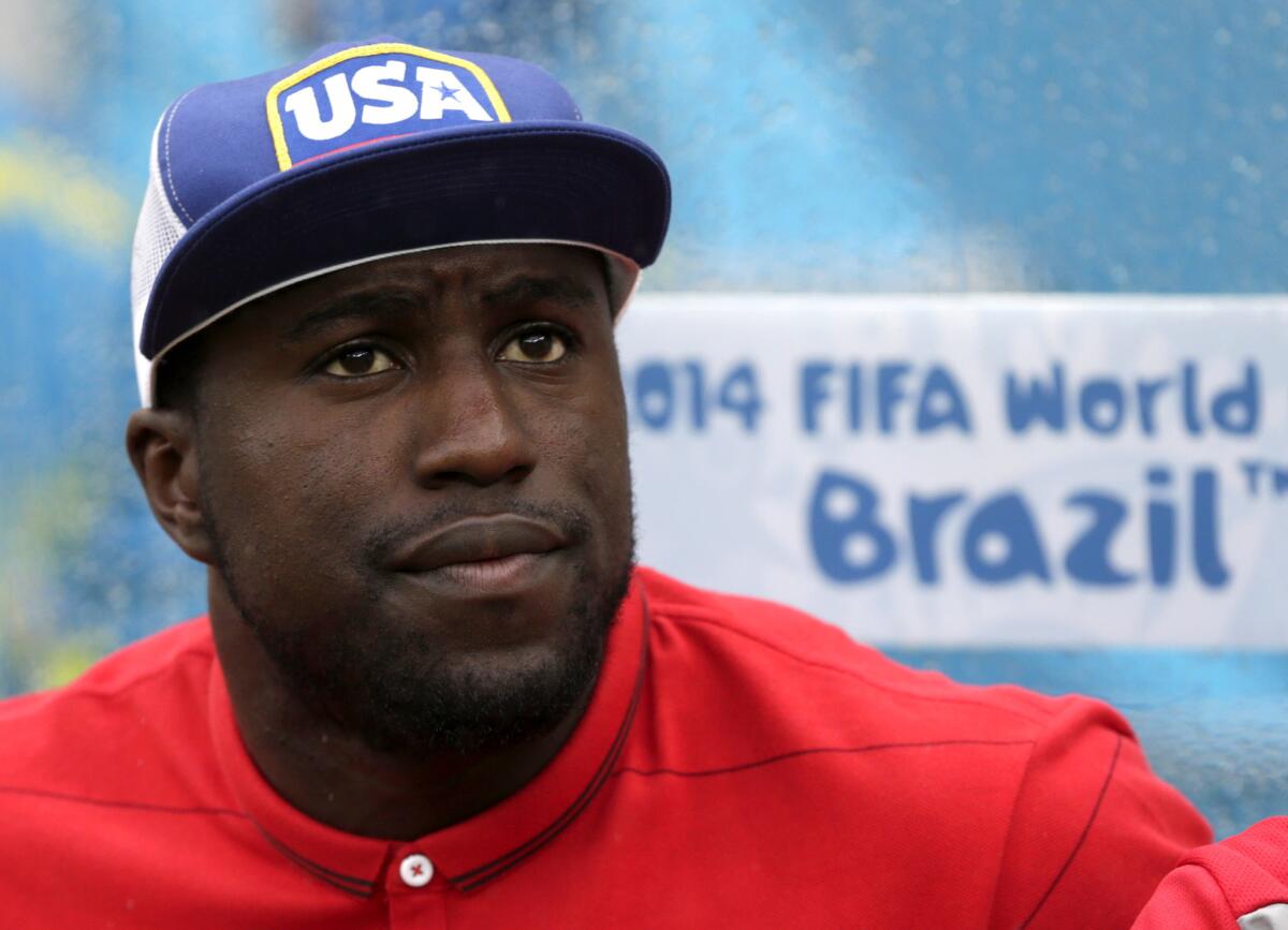 Jozy Altidore watches from the bench as the U.S. and German World Cup teams play in Recife, Brazil, on June 26.