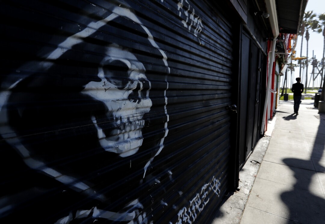 Shuttered shops line Windward Avenue in Venice Beach