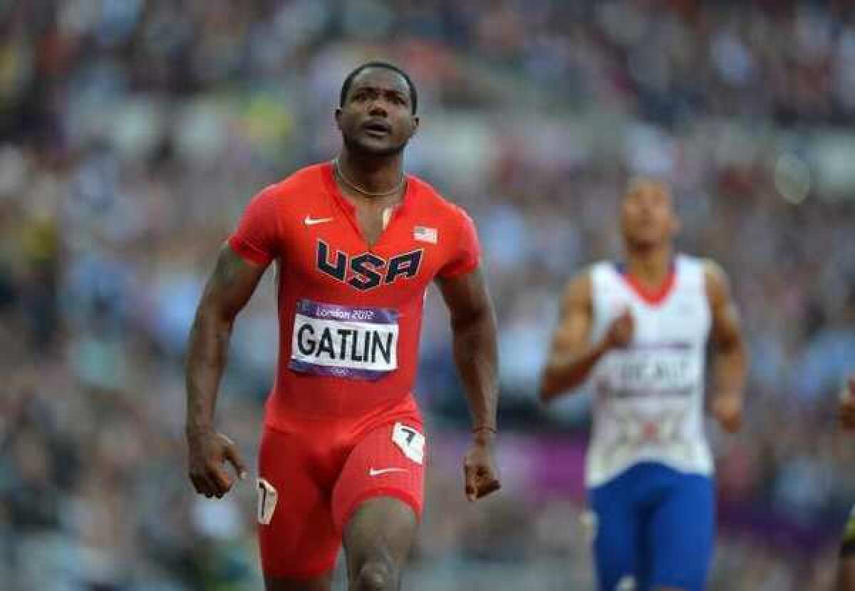 Justin Gatlin led all qualifiers for the men's 100-meter final.