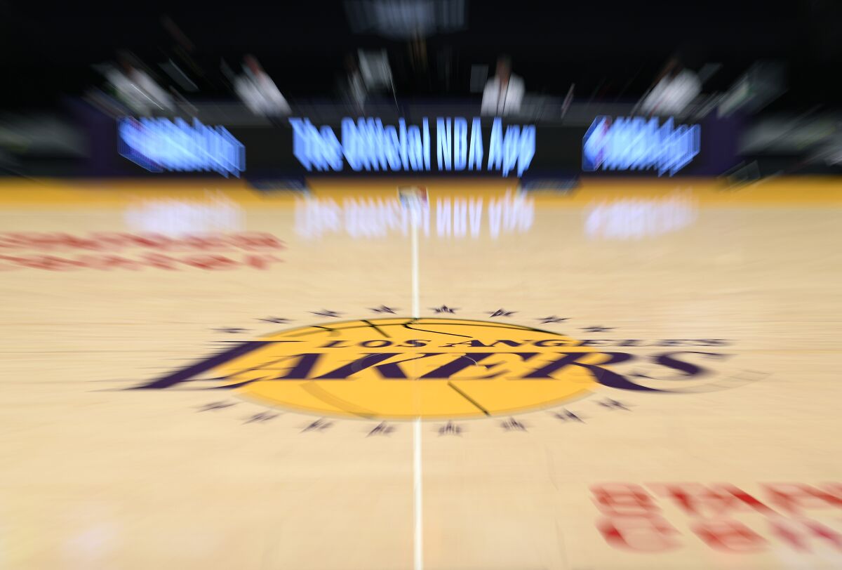 Lakers center court logo during a preseason game.