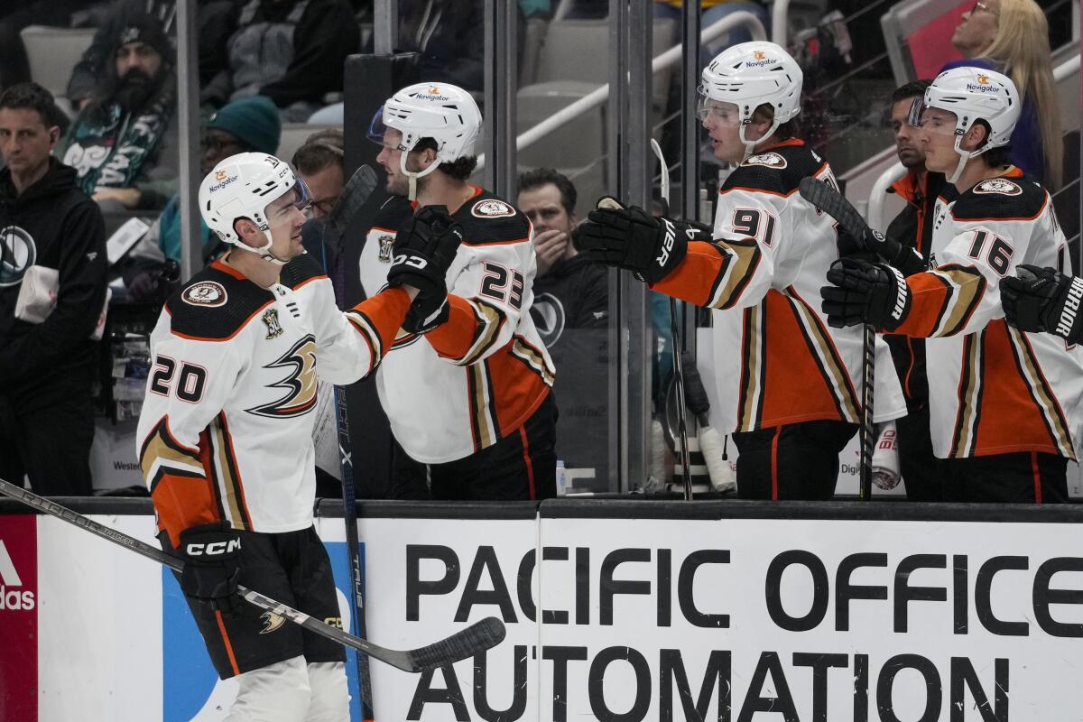 Brett Leason of the Ducks is congratulated for his goal against the San José Sharks in the first period.