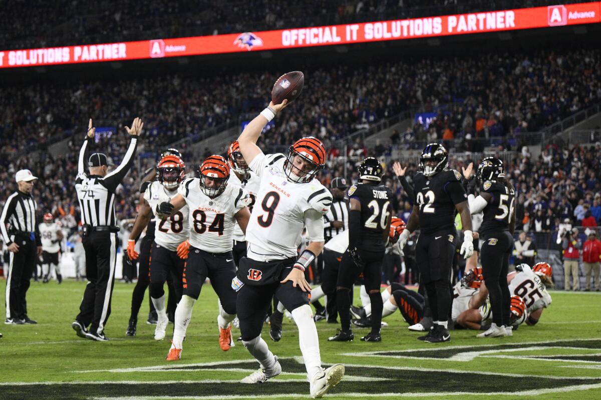 Cincinnati Bengals quarterback Joe Burrow reacts after scoring a touchdown during the second half of an NFL football game against the Baltimore Ravens, Sunday, Oct. 9, 2022, in Baltimore. (AP Photo/Nick Wass)
