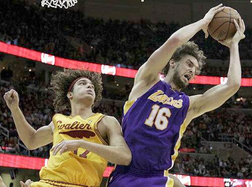 Hello Cleveland! Pau wins a rebound against Anderson Varejao of the Cleveland Cavaliers.