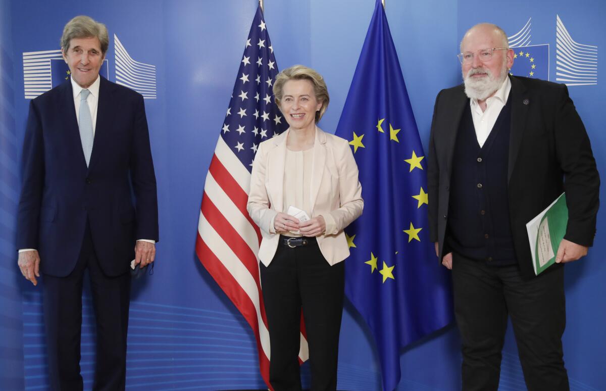 U.S. climate envoy John Kerry with European Commission officials Ursula von der Leyen and Frans Timmermans