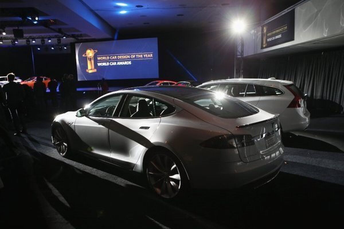 A Tesla Model S at the New York Auto Show. First-quarter sales of the car topped those of the Chevy Volt and Nissan Leaf.