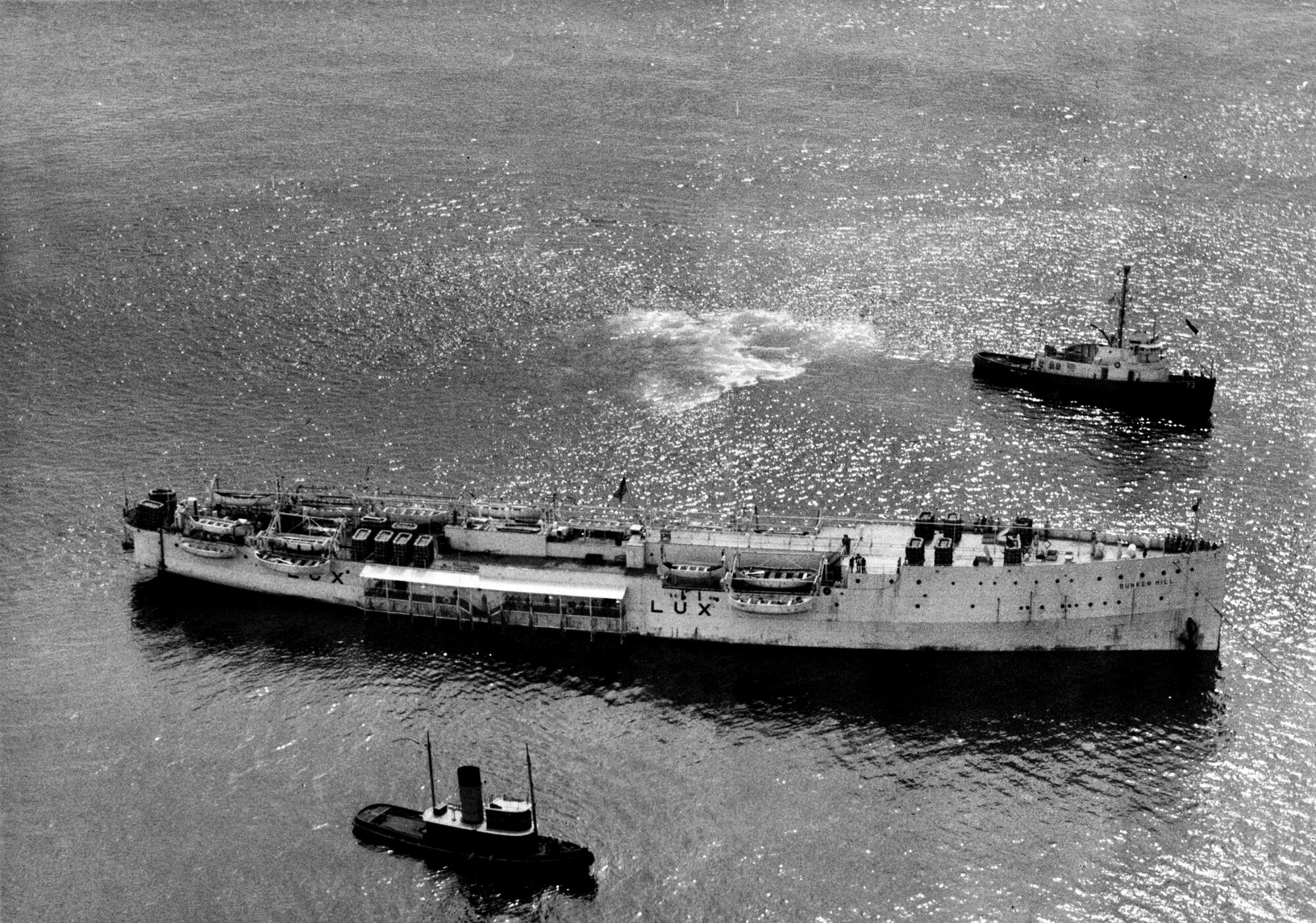Tug boats circle Tony Cornero's Lux gambling ship during its September 1946 seizure.