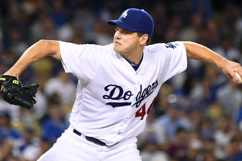 Dodgers pitcher Rich Hill pitches against the San Franciso Giants at Dodger Stadium Tuesday.