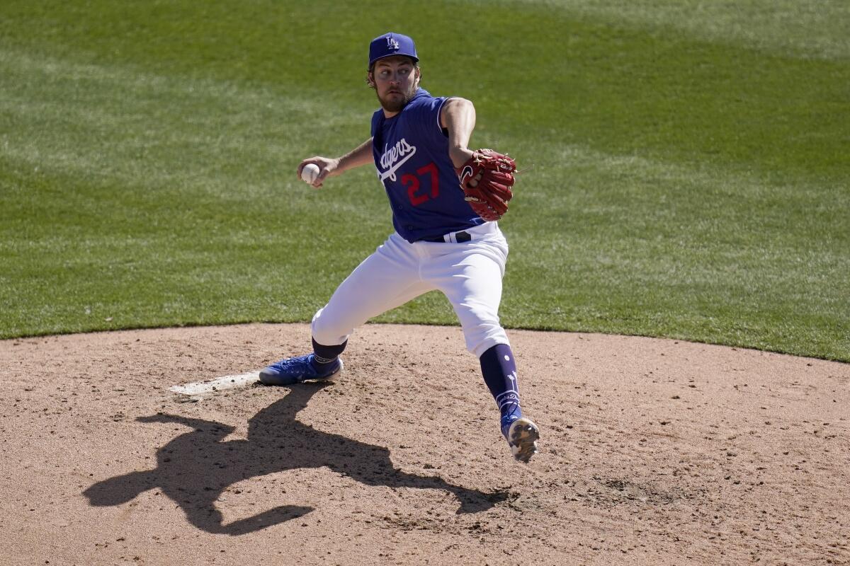 Los Angeles Dodgers pitcher Trevor Bauer throws a pitch against the Milwaukee Brewers.