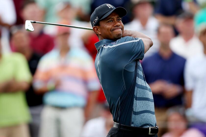 Tiger Woods will miss the NB3 Challenge charity event this week because of back spasms.