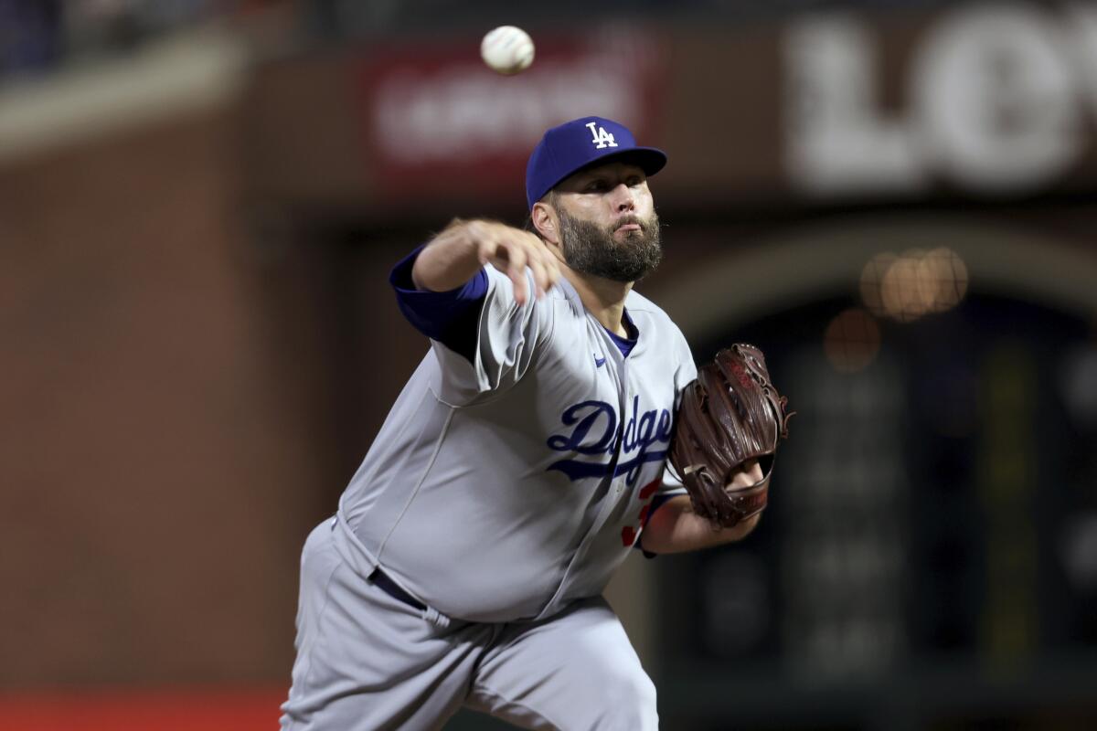 Dodgers starting pitcher Lance Lynn delivers in the first inning against the Giants.