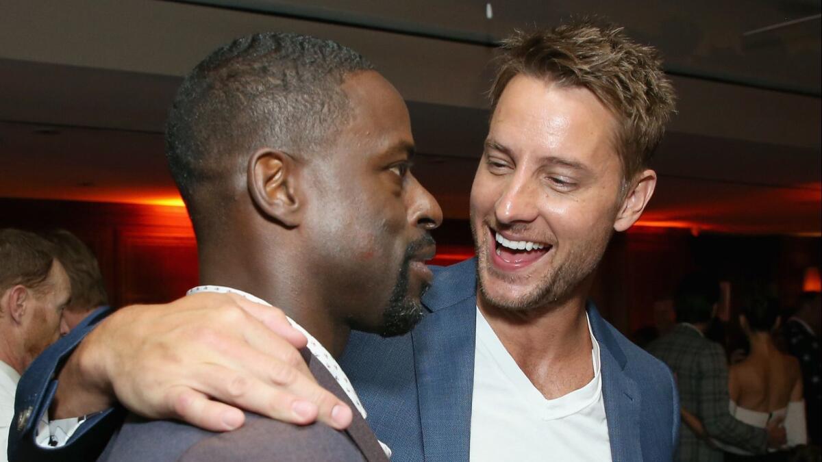 "This Is Us" co-stars Sterling K. Brown, left, and Justin Hartley attend the 2018 pre-Emmys party hosted by Entertainment Weekly and L'Oreal Paris at Sunset Tower in West Hollywood.