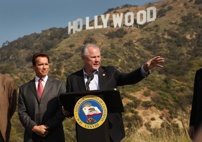 Former City Councilman Tom LaBonge, right, with then-Gov. Arnold Schwarzenegger.