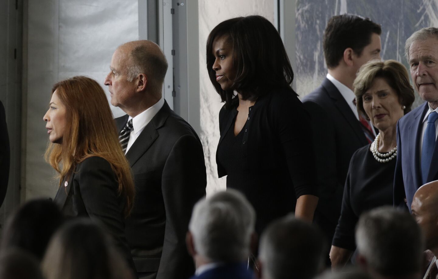 First Lady Michelle Obama, center, arrives with former President George Bush, right, and his wife, Laura Bush, second from right, and Calif. Gov. Jerry Brown, second from left, for the funeral services for former First Lady Nancy Reagan.