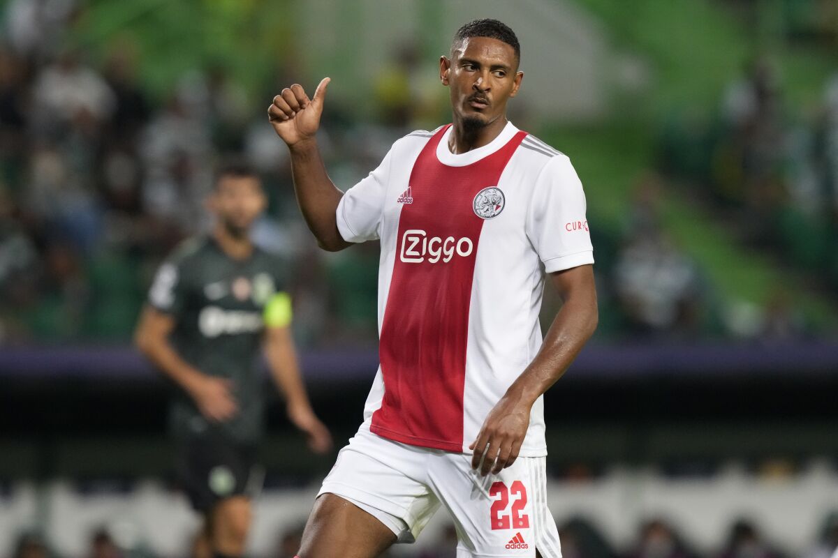 Ajax's Sebastien Haller gestures during a Champions League, Group C soccer match between Sporting CP and Ajax at the Alvalade stadium in Lisbon, Wednesday, Sept. 15, 2021. (AP Photo/Armando Franca)