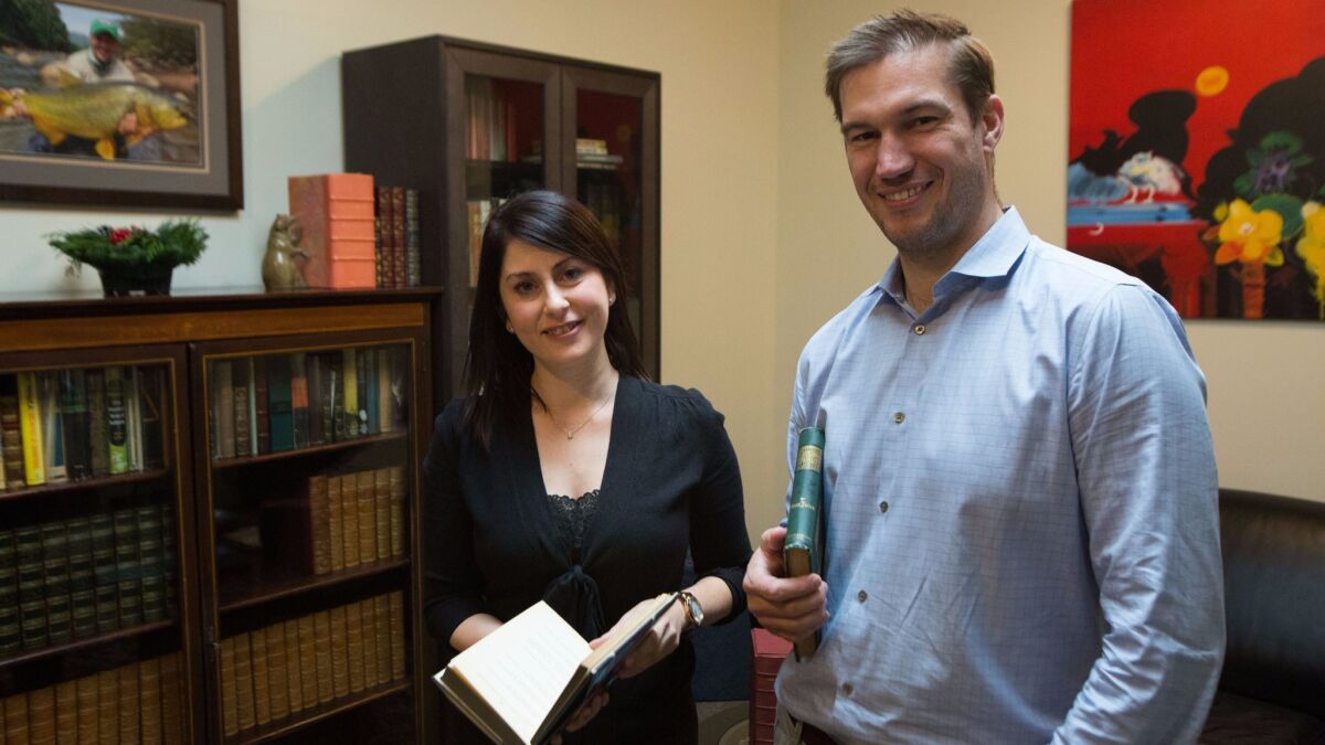 Whitmore Rare Books associate Miranda Garno Nesler, left, and owner Dan B. Whitmore.