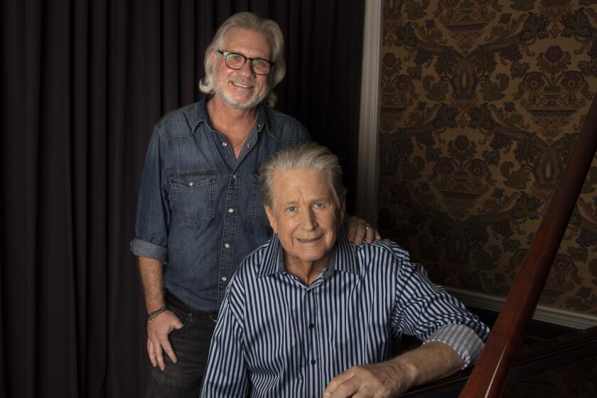 LOS ANGELES, CA - November 02 2021: Musician Brian Wilson, right, and filmmaker Brent Wilson, left, sit for portraits at Brian's home on Tuesday, Nov. 2, 2021 in Los Angeles, CA. (Brian van der Brug / Los Angeles Times)