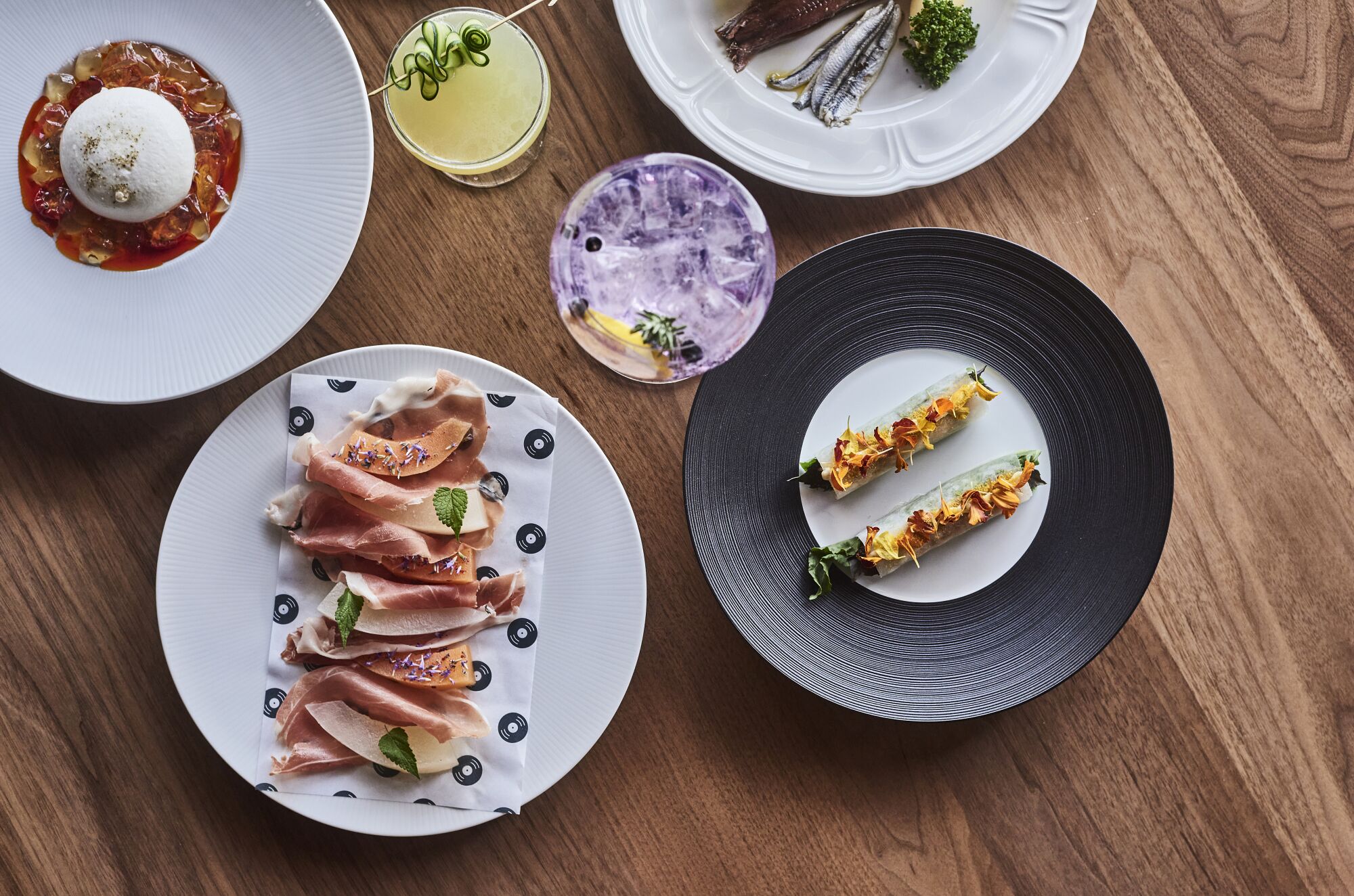A selection of food items including skewers on a table.