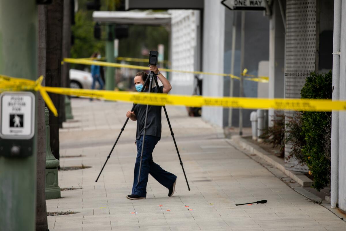 A metal pry bar lays on the ground as evidence 