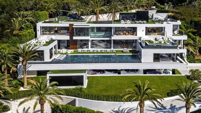 A Bel-Air mansion built on speculation is at the center of a legal dispute after a Zillow listing for the $150-million home was hijacked by an unknown user.
