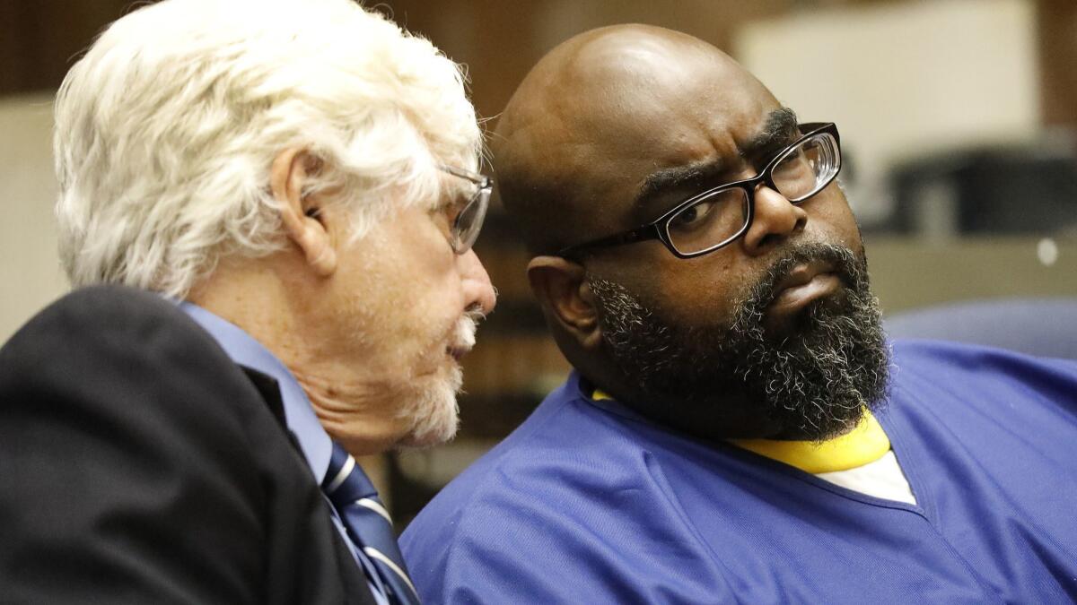 Michael Allen, right, faces the death penalty in connection with a pair of murders from 1991.